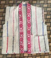 Handcrafted kantha quilt showcasing vibrant patterns as a perfect addition to sustainable fashion home décor.