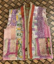 Handcrafted kantha quilt showcasing vibrant patterns as a perfect addition to sustainable fashion home décor.