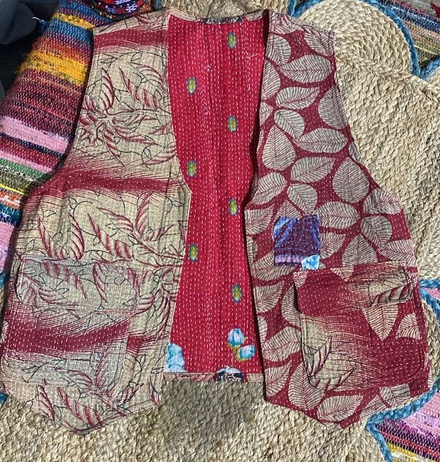 Handcrafted kantha quilt showcasing vibrant patterns as a perfect addition to sustainable fashion home décor.